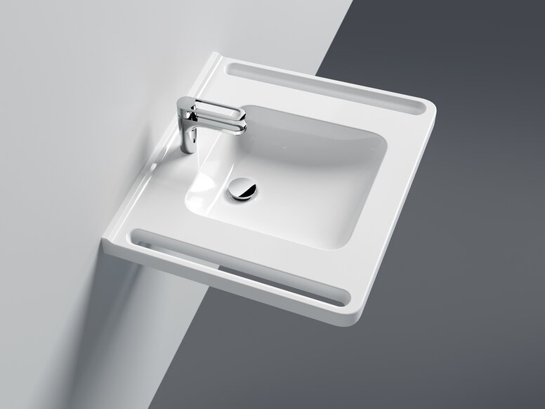 HEWI washbasin with handles Washbasin with integrated side handles and single-lever tap in chrome